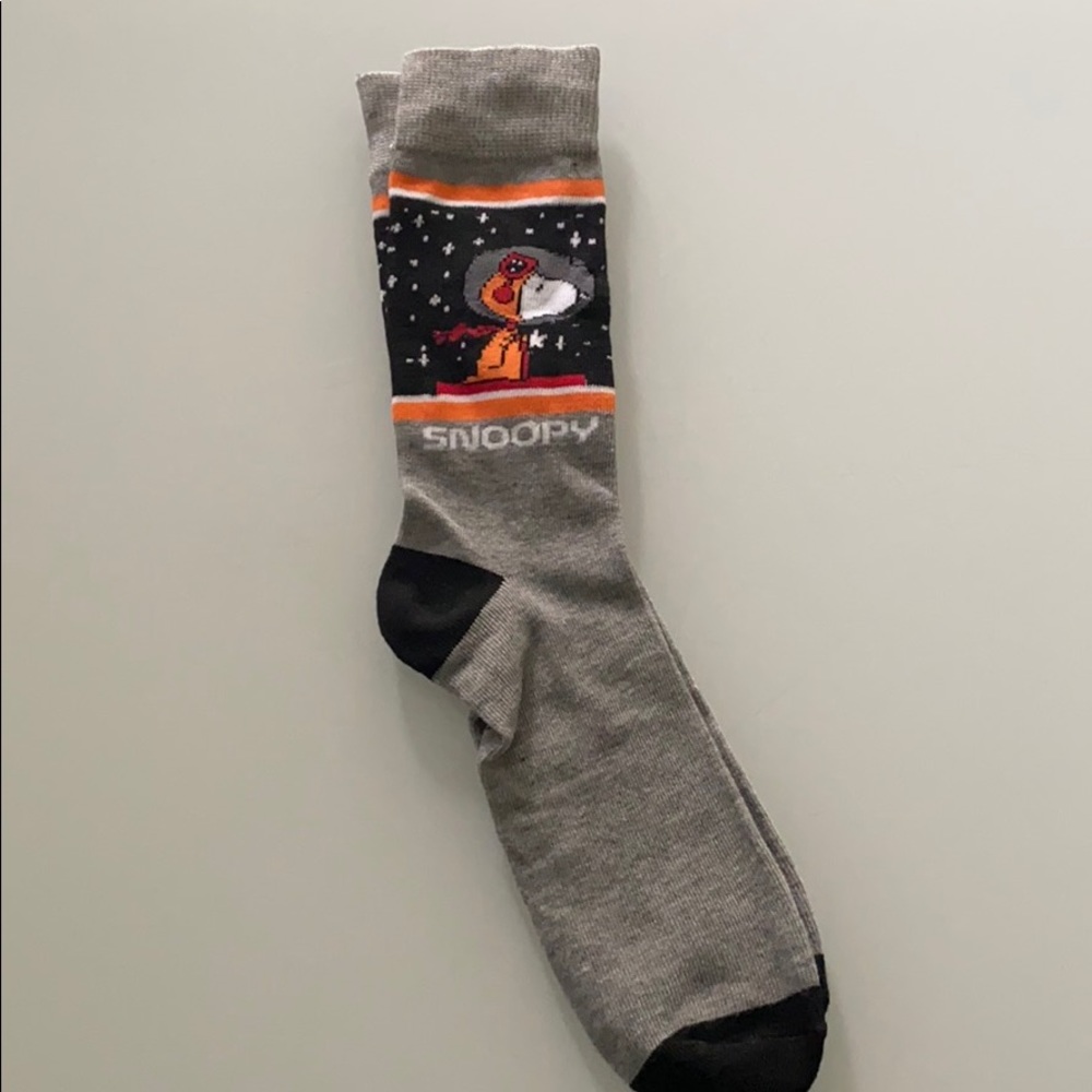New snoopy crew socks.  Adult small-medium